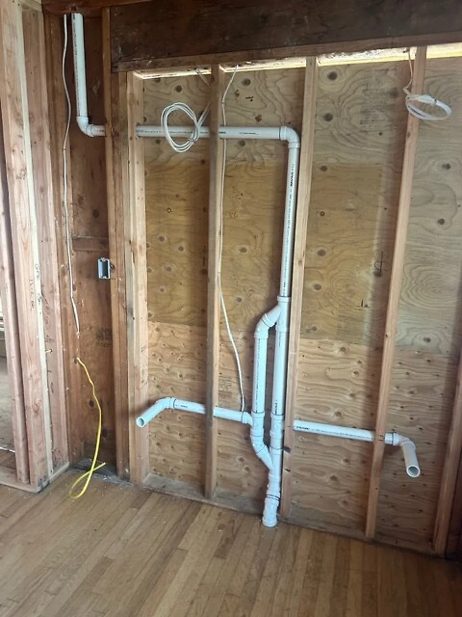 Licensed plumber installing plumbing fixtures for GB Comfort Services in Jefferson Township