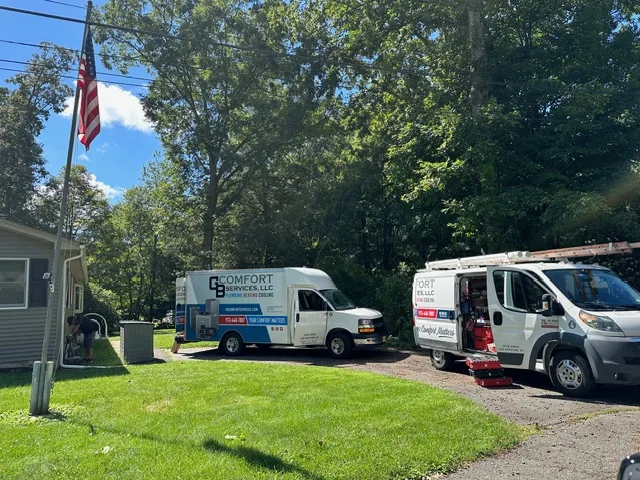 GB Comfort Services service vans in a Jefferson Township neighborhood